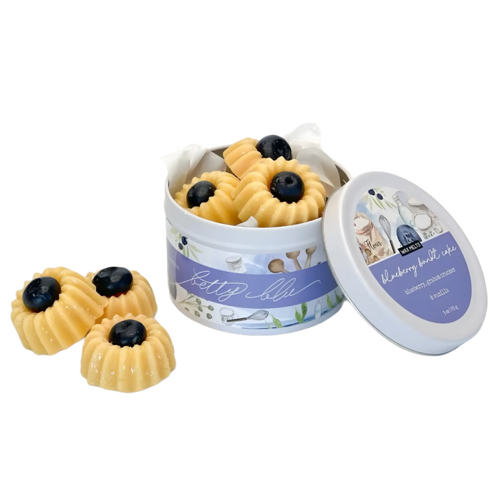 Mini bundt cake-shaped wax melts with glossy blueberry centers in a pastel bakery tin — sweet scent of blueberry, graham cracker, and vanilla by Betty Blu