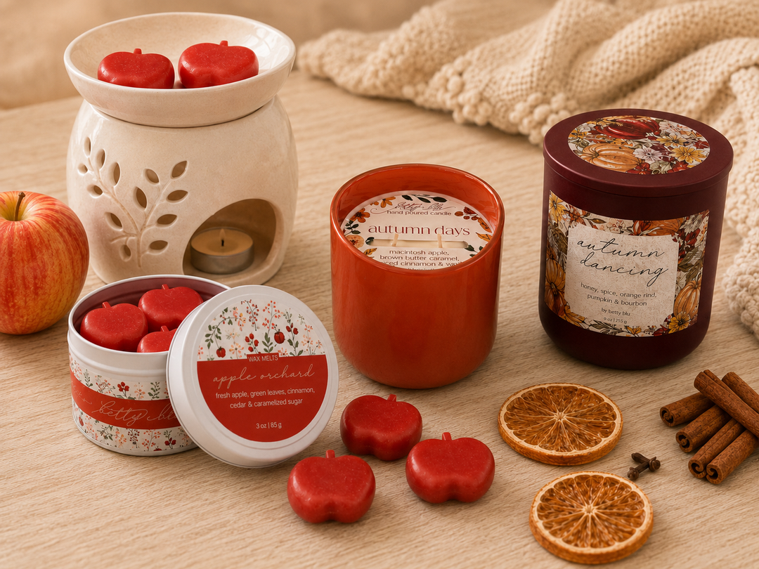 The Autumn Gift Set from Betty Blu, the Autumn Days and Autumn Dancing candles with Apple Orchard wax melts, hand poured in small batches