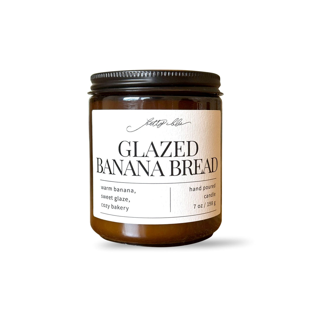 Cozy banana bread scented candle in amber glass.