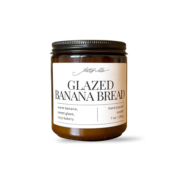 Cozy banana bread scented candle in amber glass.
