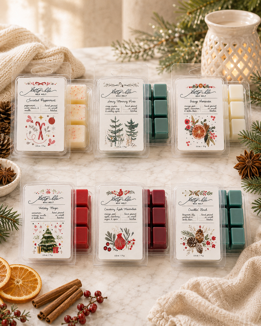 The Holiday Sampler gift set from Betty Blu, six holiday wax melts including Orange Pomander, Cranberry Apple Marmalade, Cracklin Birch, Snowy Morning Pines, Twisted Peppermint and Holiday Magic