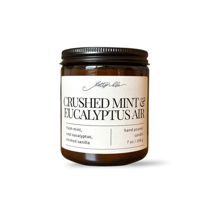 Crushed Mint and Eucalyptus Air candle in amber glass jar.