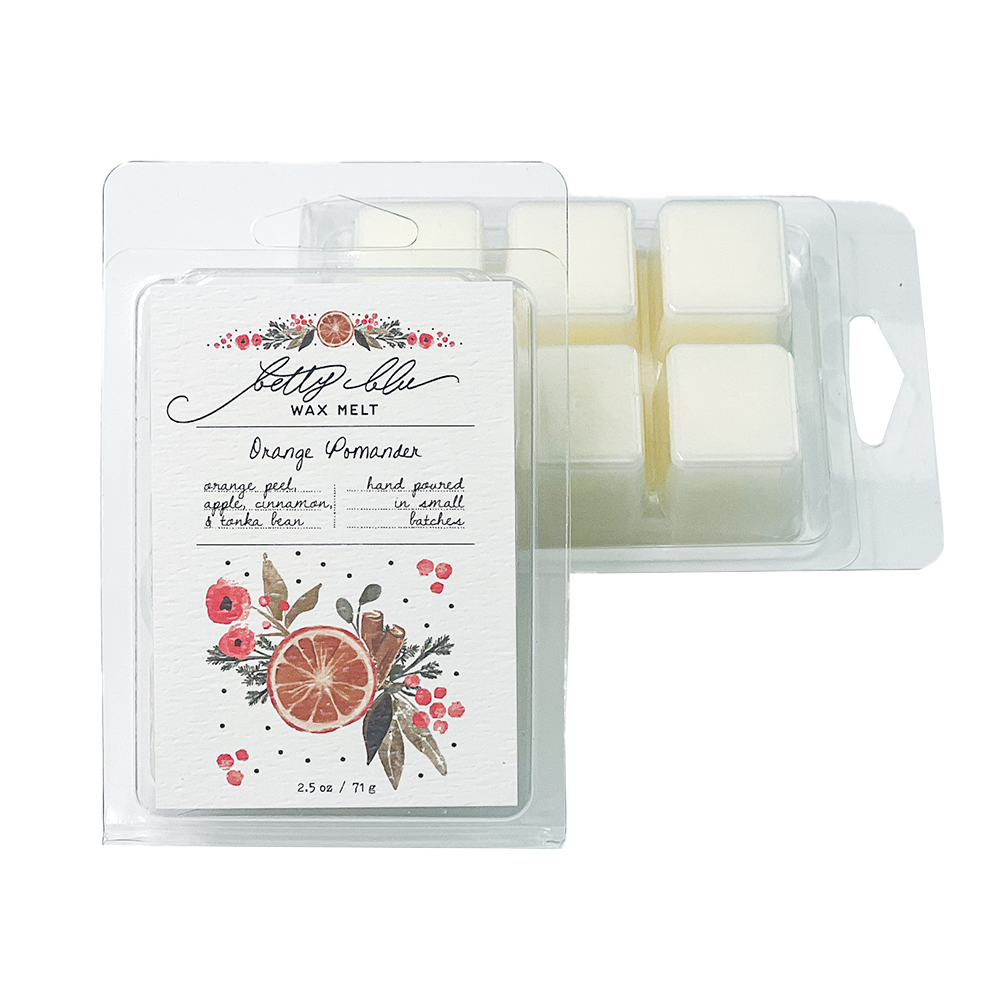 Orange Pomander clamshell wax melts with citrus and clove label, hand-poured in small batches.