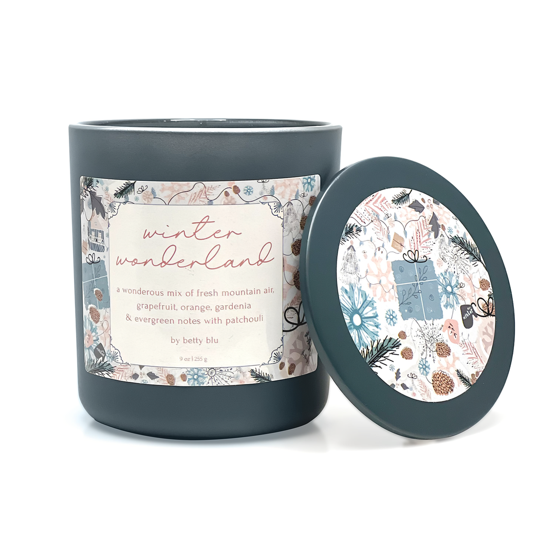 Winter Wonderland candle with patterned lid and holiday design.