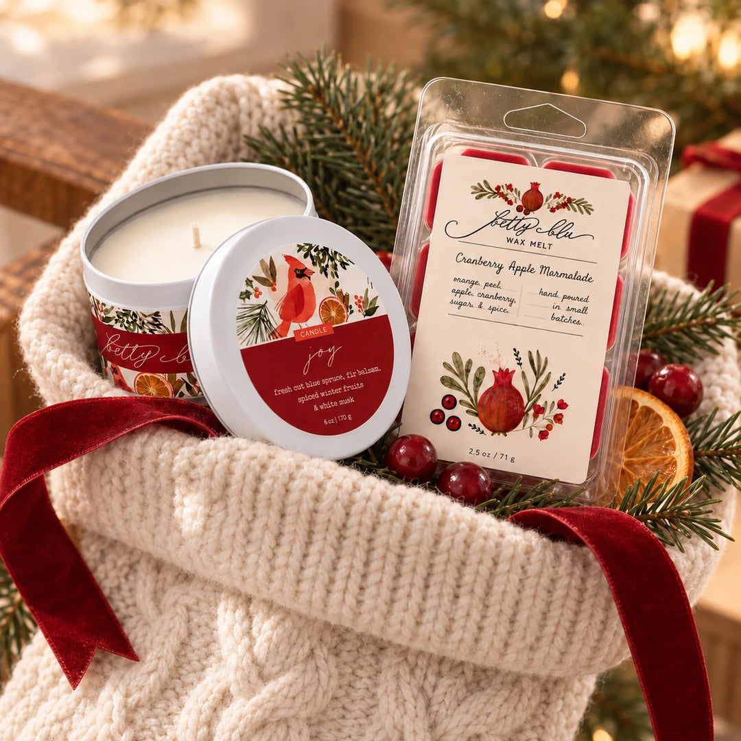 The Stocking Stuffer gift set by Betty Blu, Joy candle tin and Cranberry Apple Marmalade wax melts in a knit stocking